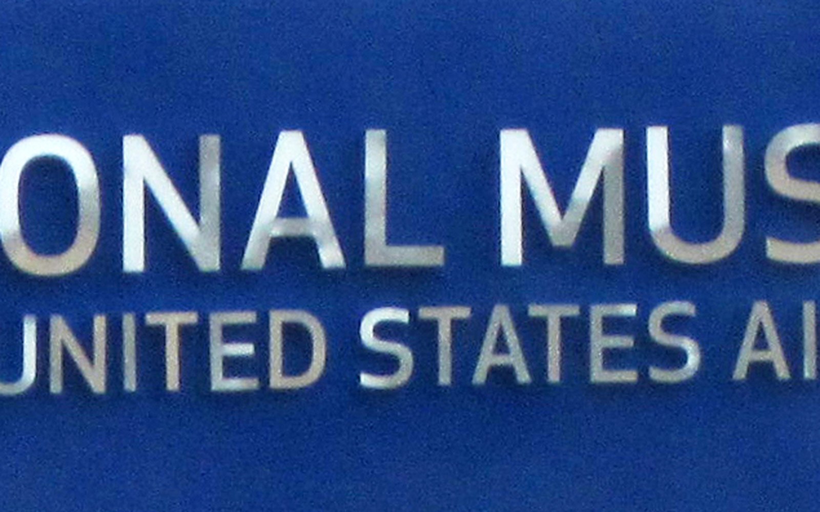 Close-up of raised metal lettering reading National Museum of the United States Air Force